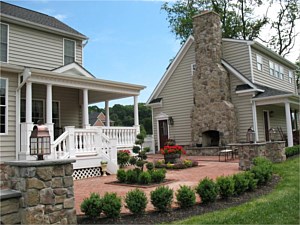 Courtyard with stone pillars and outdoor fireplace